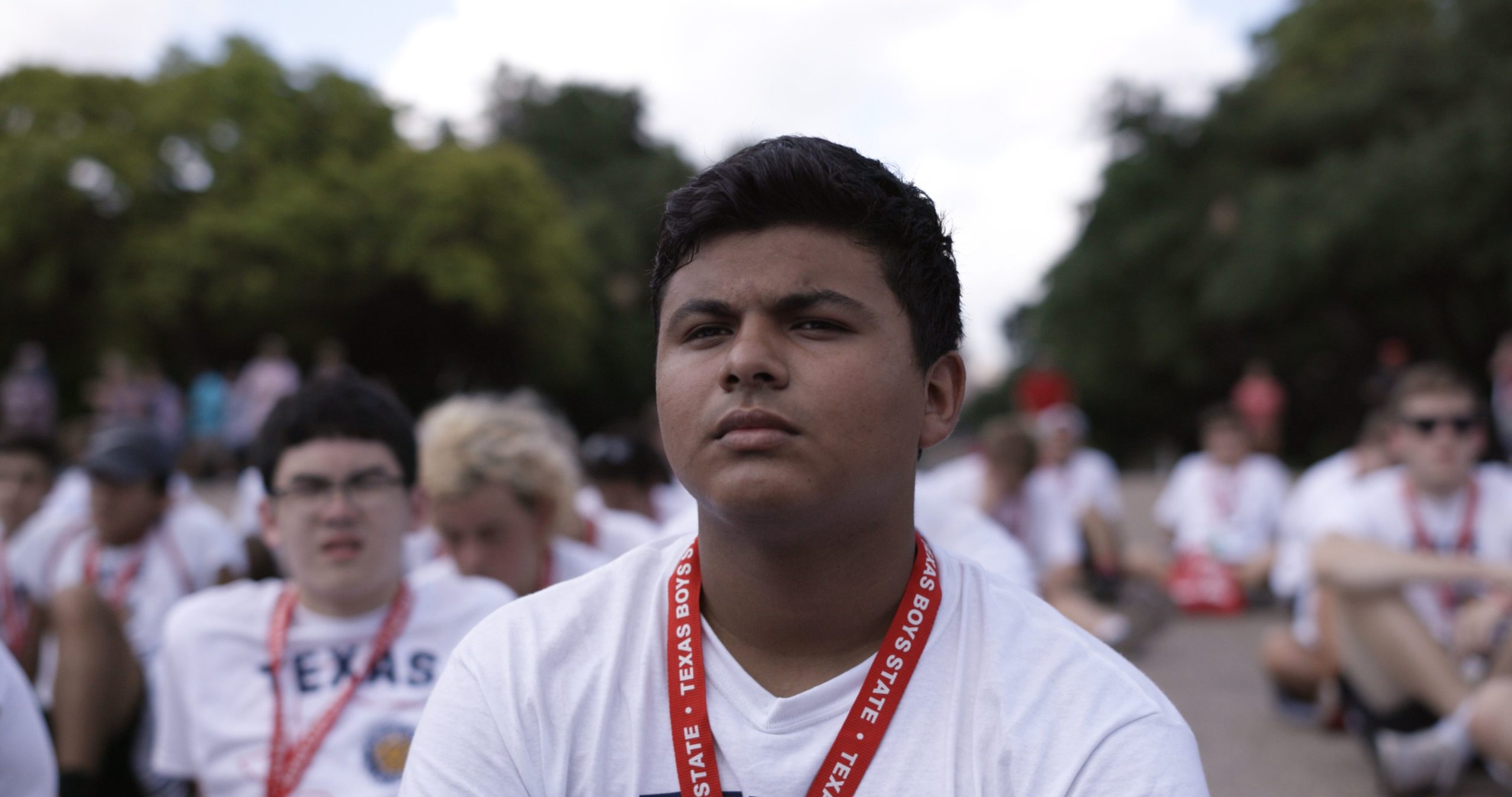 Steven Garza from Boys State standing in a crowd